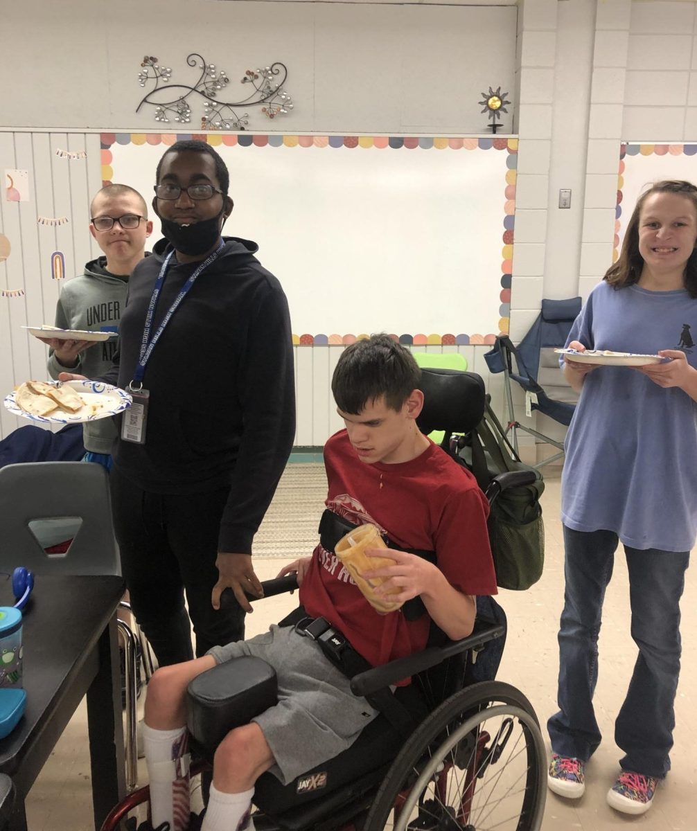 (Left to Right) Sophomores Tristan Lundstrom, Isaiah Johnson, Conner Morris, and  Cassie Aulwes celebrate Hispanic Heritage month in Mrs. Underwood's class.  