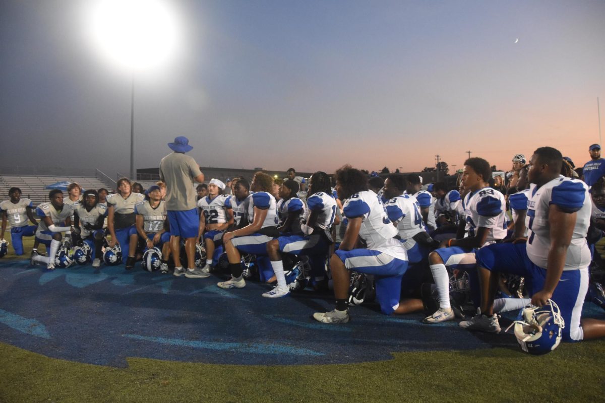 Coach JJ Houle speaks to his team at the conclusion of Bear Fest.