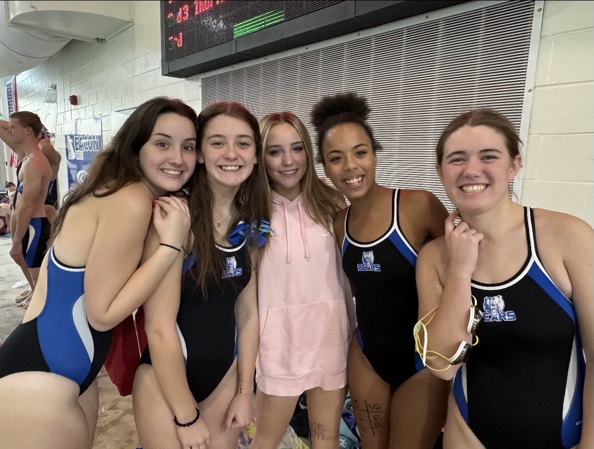 Sophomore Victoria Abram, Freshman Sara Adams, Junior Mia Mabry, Sophomore Neveah Watson, and Junior Taylor Adams swim against North Little Rock at a recent meet in Lonoke. 