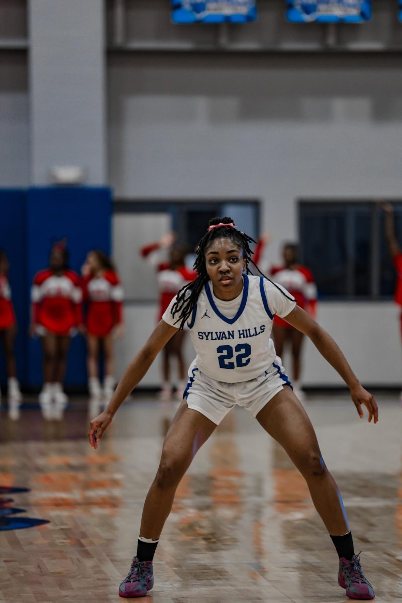 Senior Drew Lattimore defends against Maumelle in the second half. Lattimore scored 23 points and led the bears to a 44-35 win over the Hornets. 