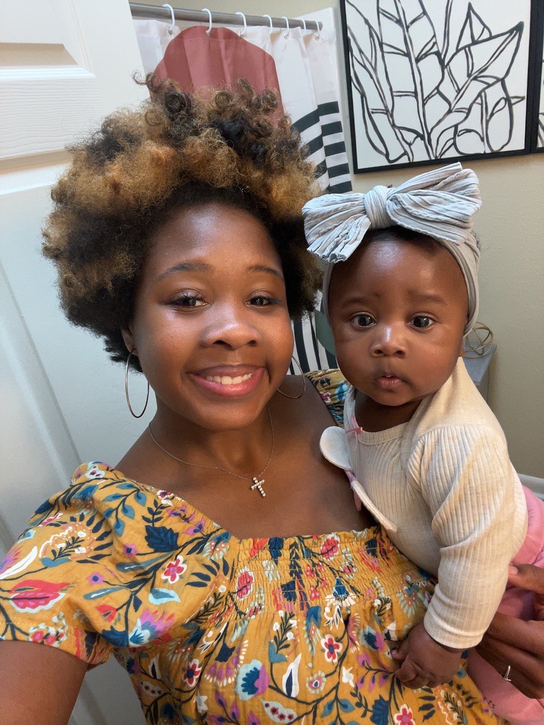 Ms. Thomas poses with daughter Zuree. Ms. Thomas can be found in building 1 teaching Food, Safety and Nutrition. 