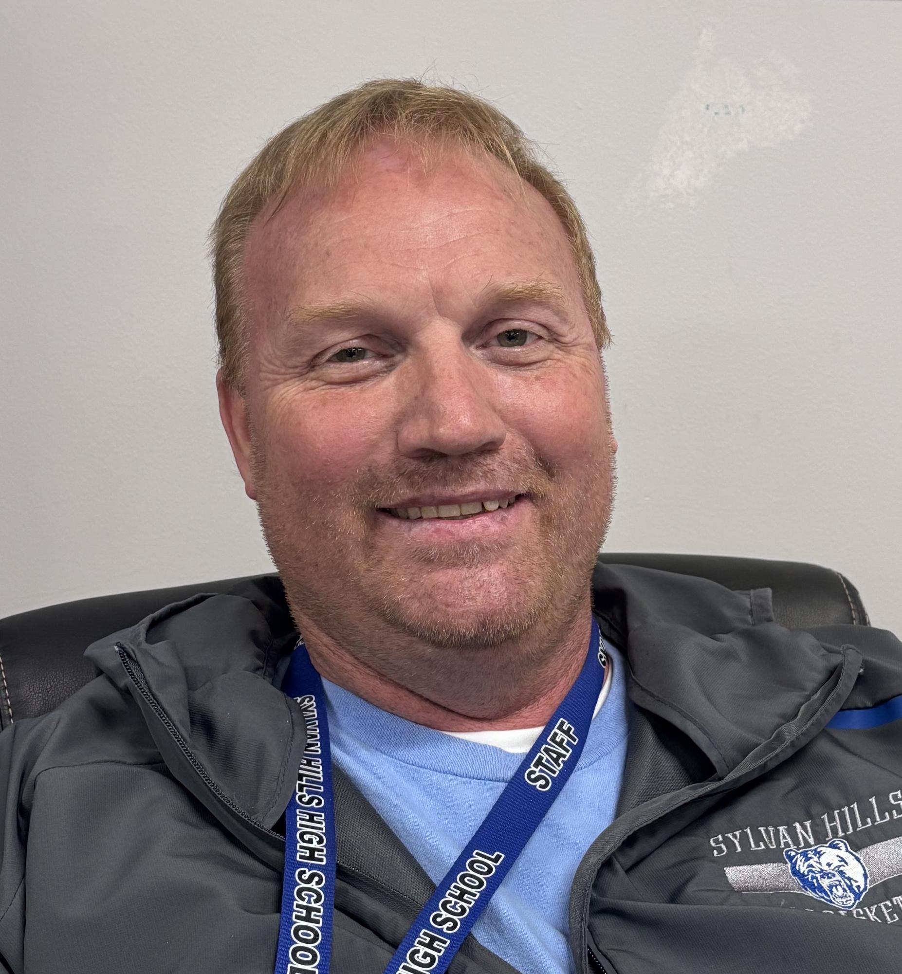 Mr. Harper takes time out from teaching Juvenile Justice to pose for Banner staff. When he's not at parking lot duty or manning the scoreboard at the basketball games, you can find him in room 218 building 12. 