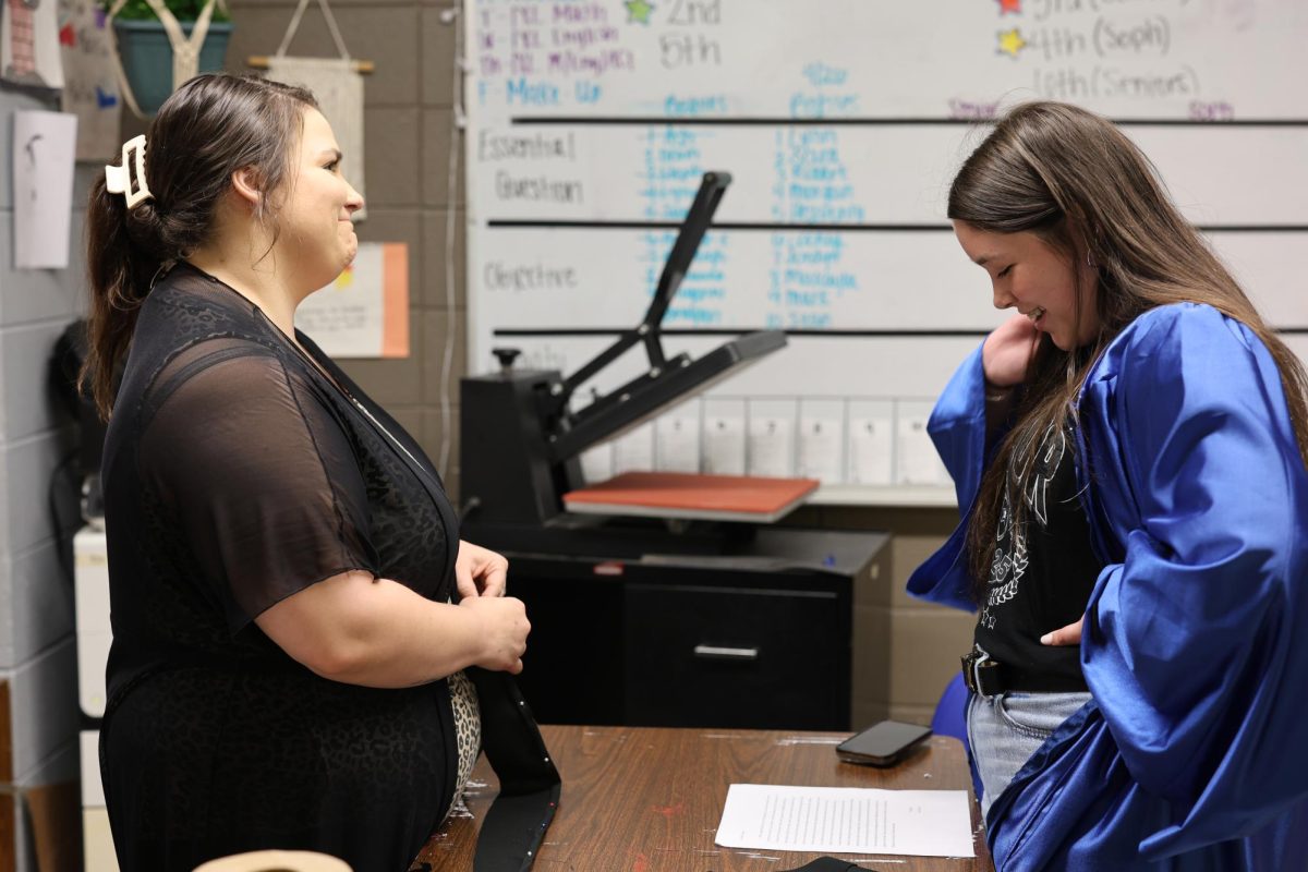 Senior Grace Davis reads her letter to Ms. Sisson. This week seniors delivered letters to teachers who have impacted their lives. 