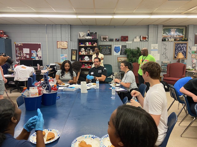 Three judges judge the last three burgers for the final. Ms. Cummings' classes participated in the Burger Wars competition to decide who made the best burger. This was the first year for the event. 