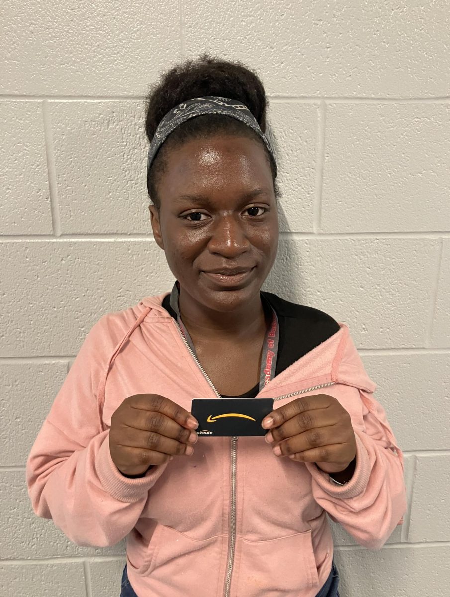 Junior Heavenly Wiley poses with her Amazon gift card. Wiley recently won a Hillside Banner drawing. 