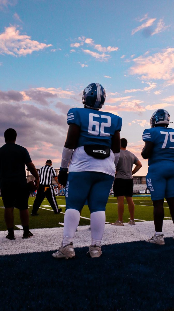 Korda' Fulton (11) watches from the sideline as Sylvan Hills' defense puts a stop to Sheridan. Sylvan Hills JV won 48-27.
