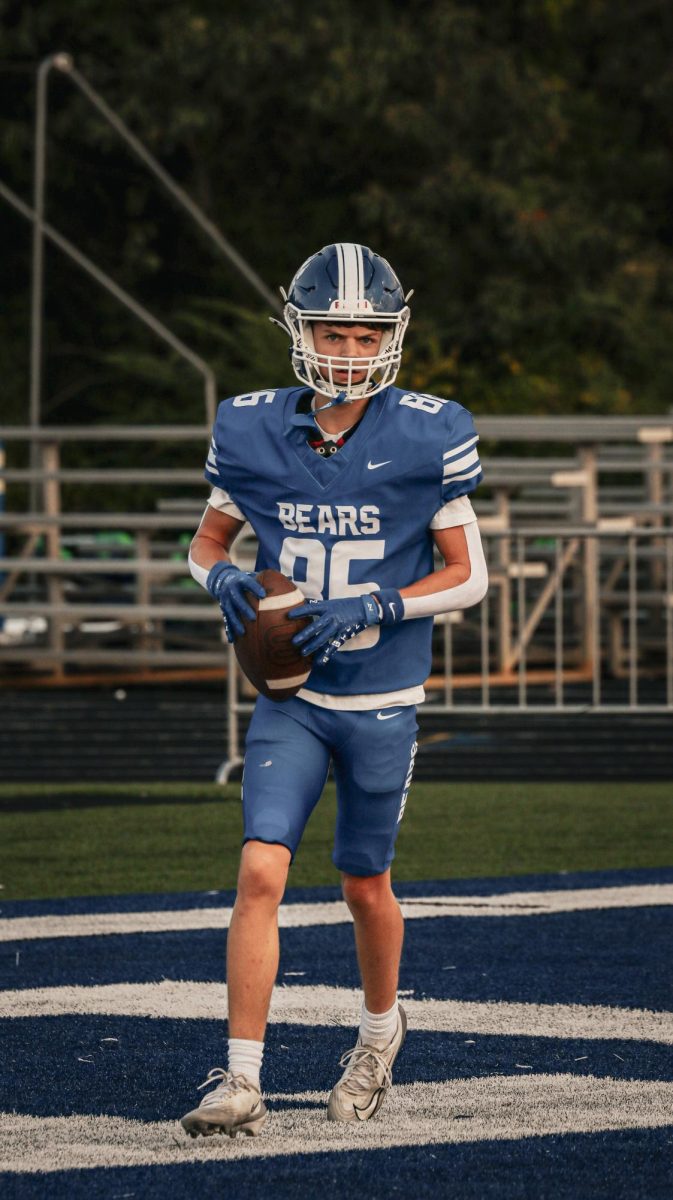 Grant Mills (11) runs back to the offensive line after completing a catch against Sheridan on Tuesday night's JV game.