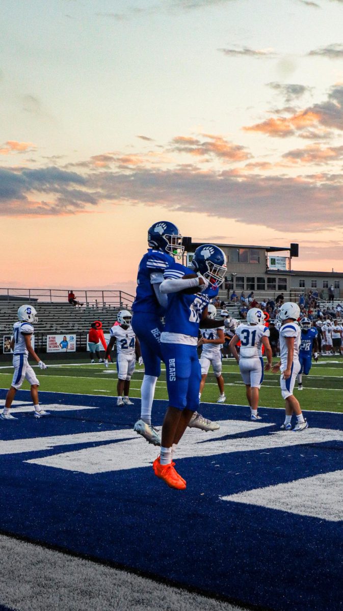 Maurice Phillips (10) celebrates touchdown with teammate against Sheridan. Sylvan Hills JV won 48-27