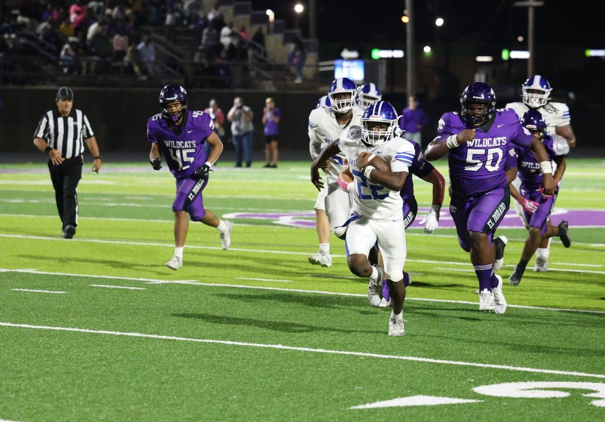 Junior Isaiah Howell breaks through on his way to scoring a touchdown against El Dorado. Sylvan Hills won 25-10.