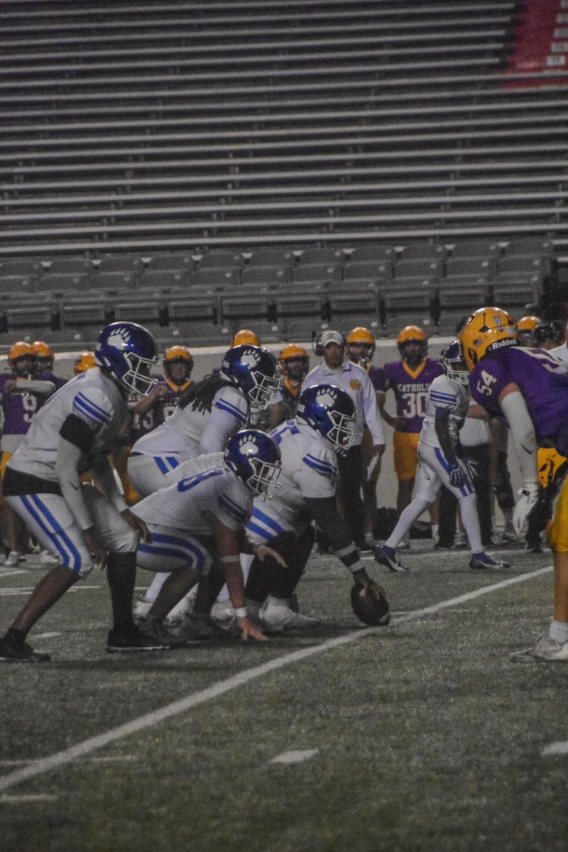 Offense gets ready to snap the ball in game versus Catholic. Bears win 50-22