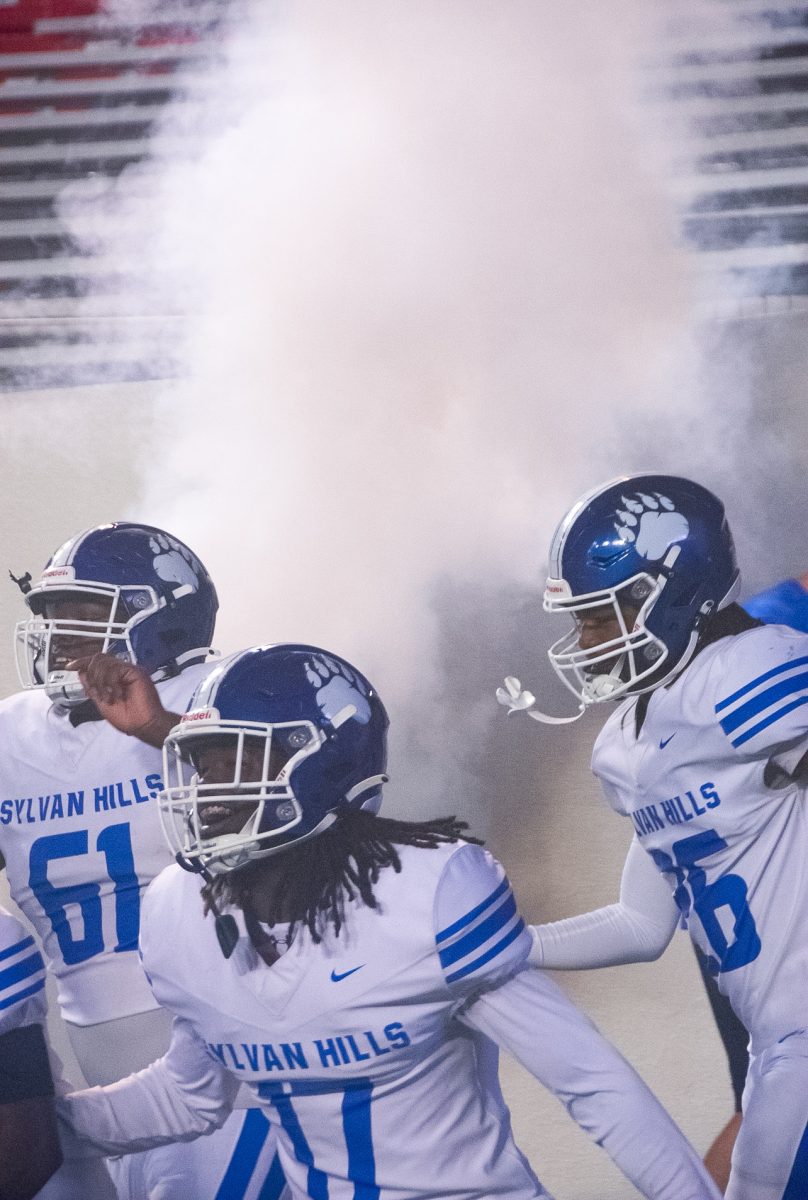 Bears players run out from the tunnel before their game at War Memorial in LIttle Rock against the Rockets. The Bears won game 50-22.