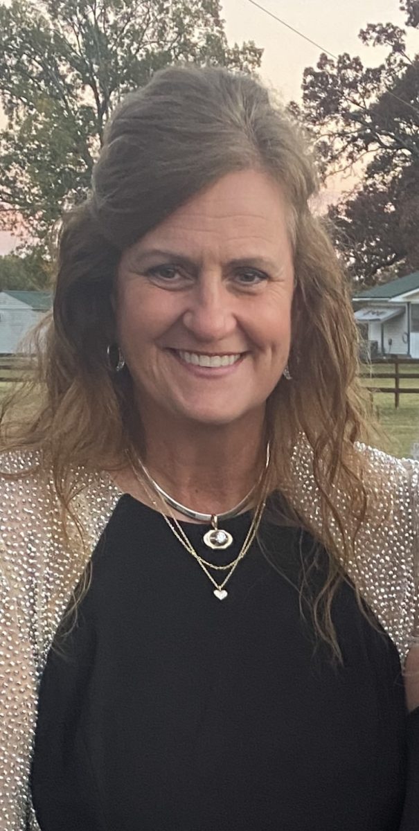 Larie Scallon stands in front of her son's wedding venue. Scallon has taught at Sylvan Hills for 34 years. 
