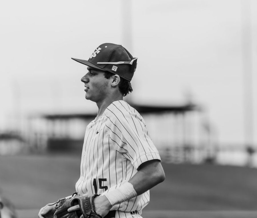 Koen Baugher is working hard on second base at the Sylvan Hills baseball field during a game.