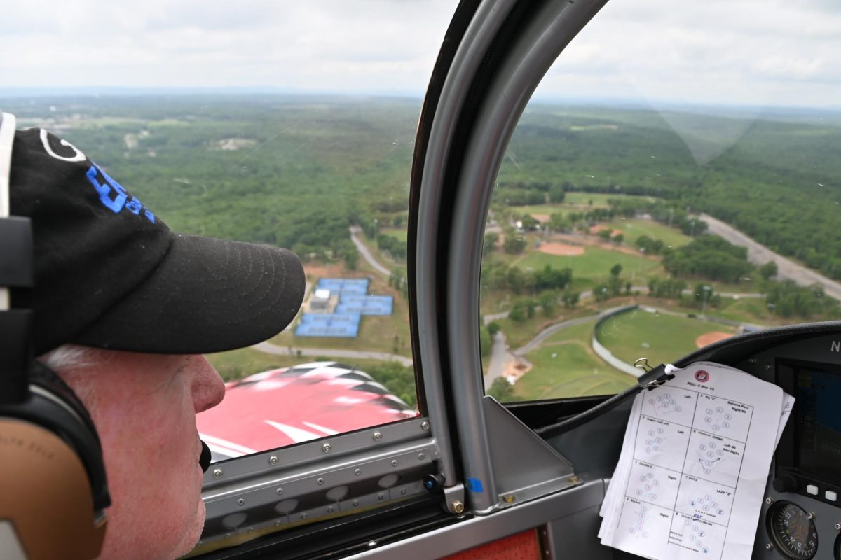 An EAA pilot overlooks the city of Sherwood softball and baseball fields. Students interested in flight can join Aviation Club during Club Rush in the fall. 