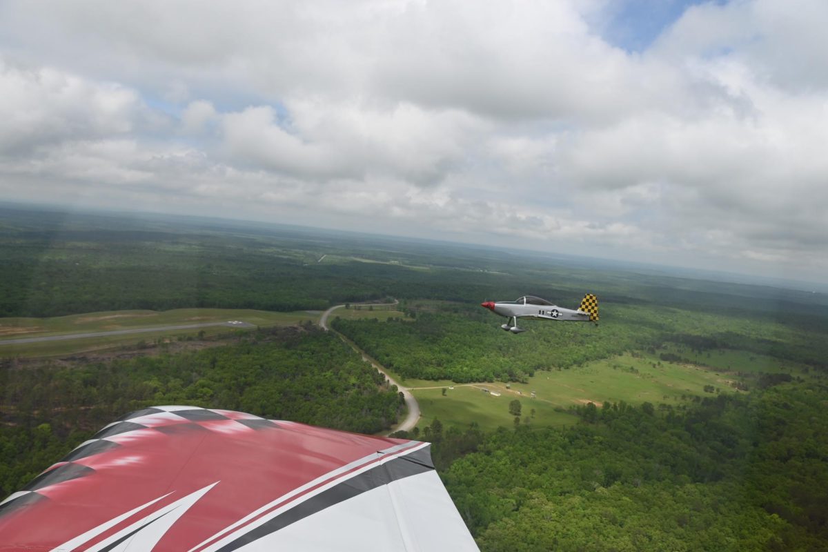 Sophomore Liam Fisher flies next to Mr. Scroggins somewhere over Pulaski County. Students signed up for Young Eagles flights sponsored by EAA. 