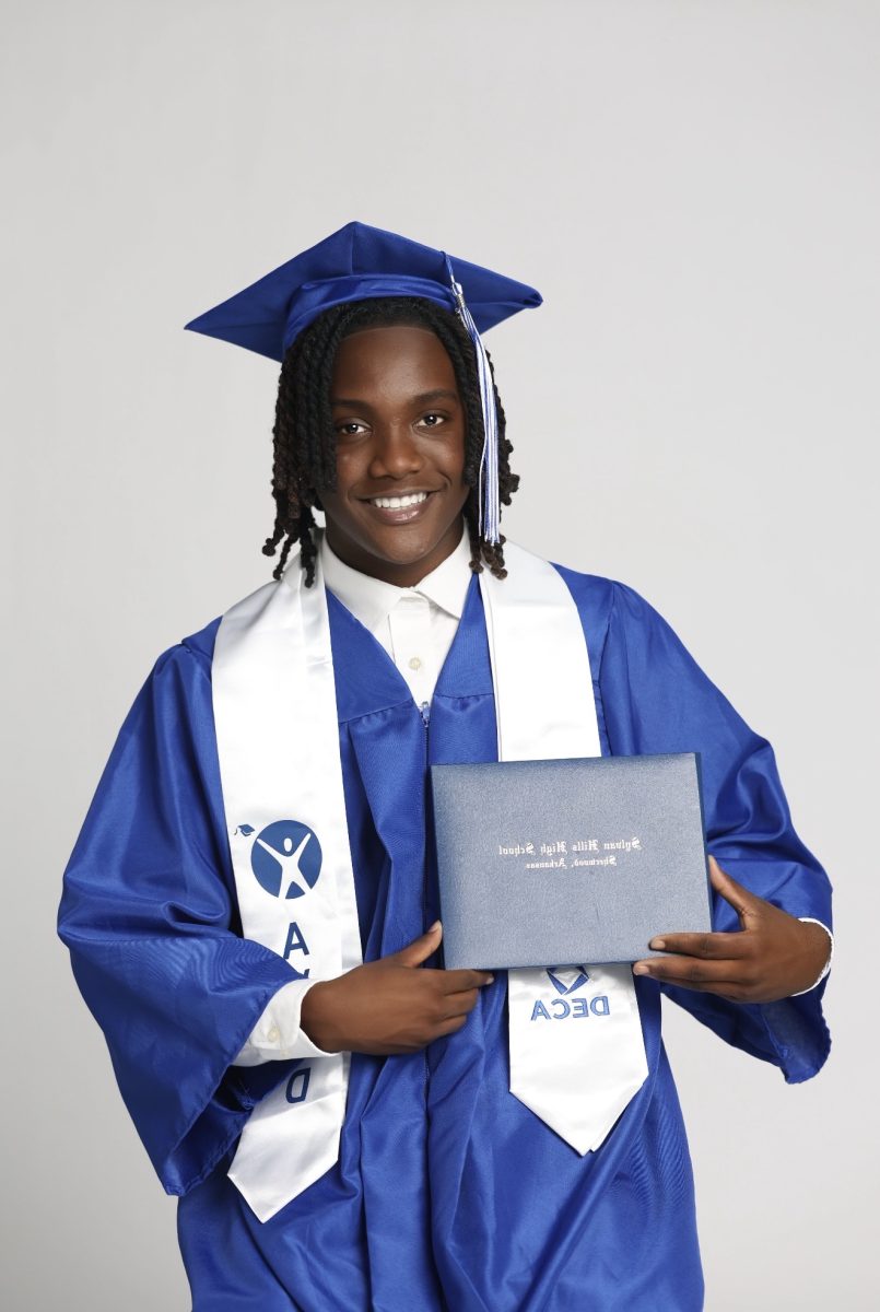 Senior, Cameron Jackson poses for his senior photos. 