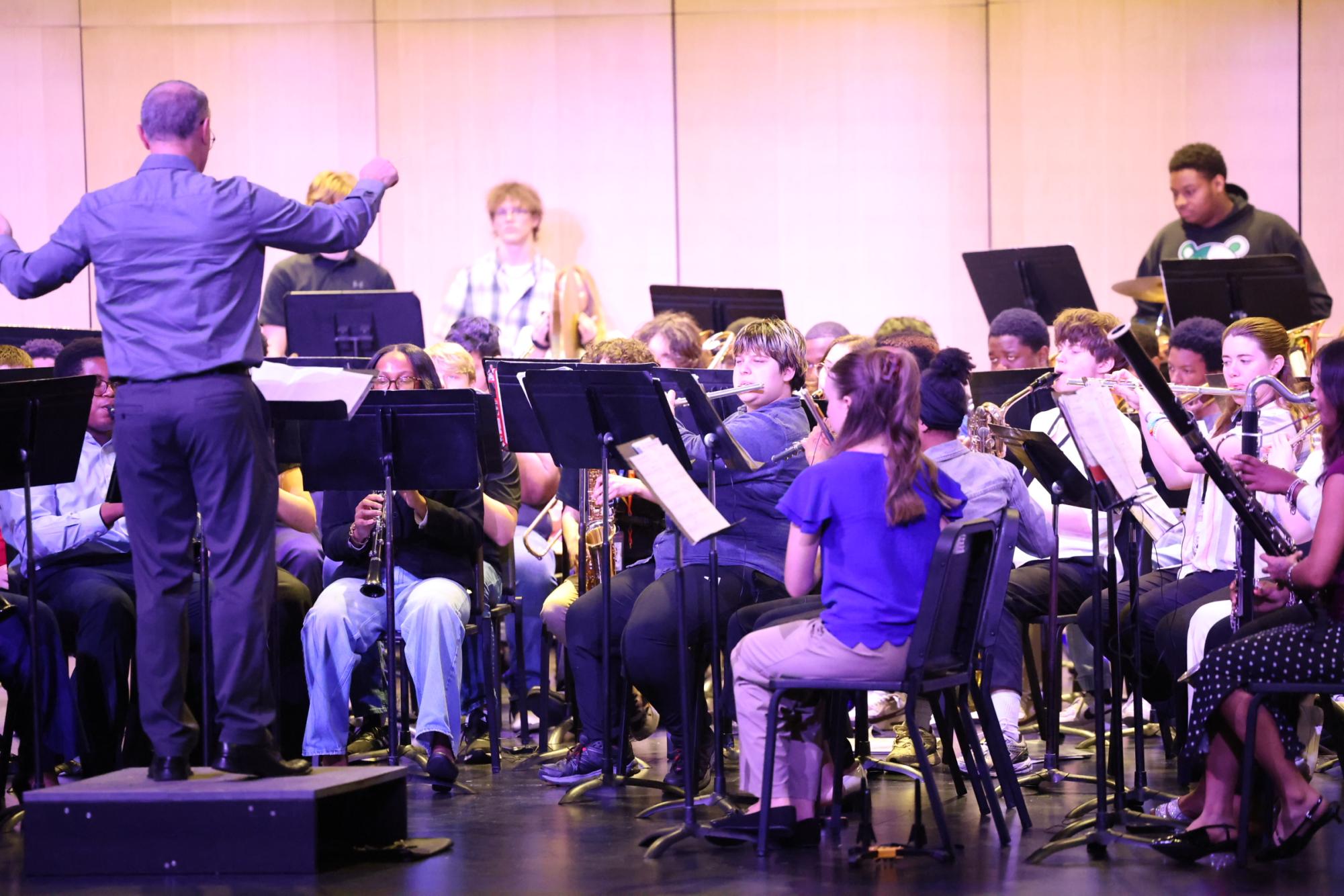 Students perform a John Williams song during their recent concert. Band held a benefit concert April 29 to fundraise for band projects and to allow students to share their talents. 